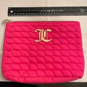 Juicy Couture hot pink make up bag. Gold and rhinestone accents.